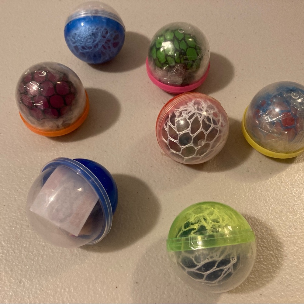 Lot 7 New Sealed Prize Plastic Balls with Toys Inside Great Party Favors